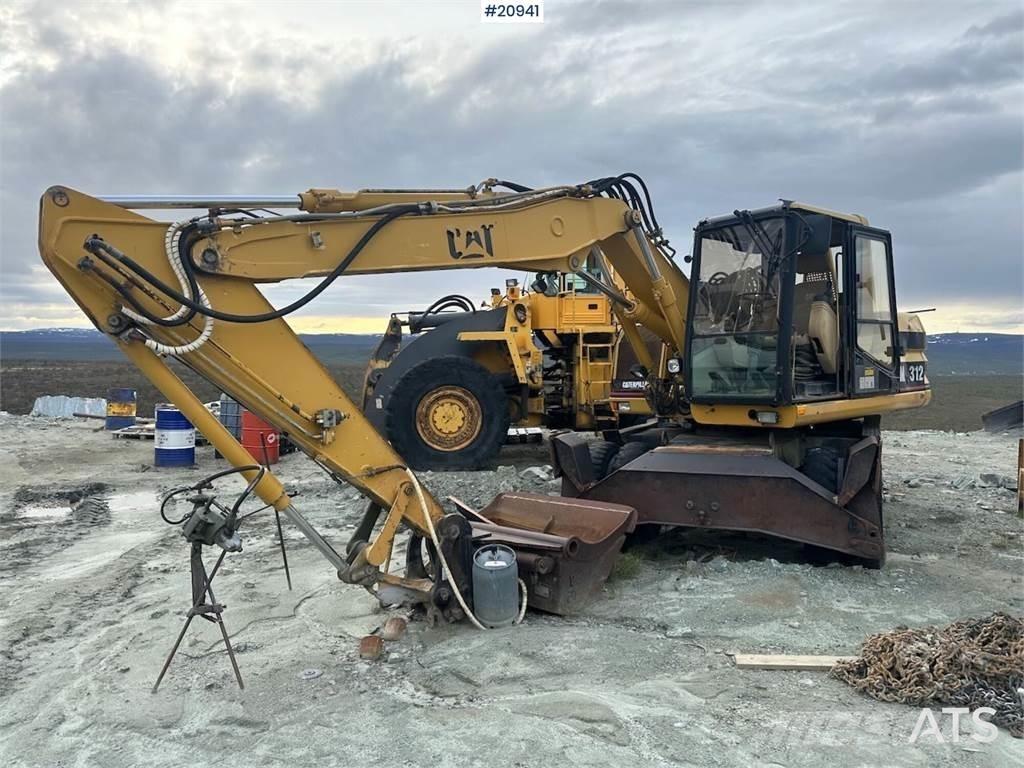 CAT 312 Excavatoare cu roti