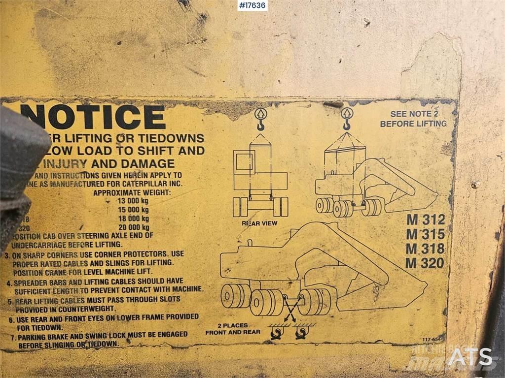CAT M312 Excavatoare cu roti