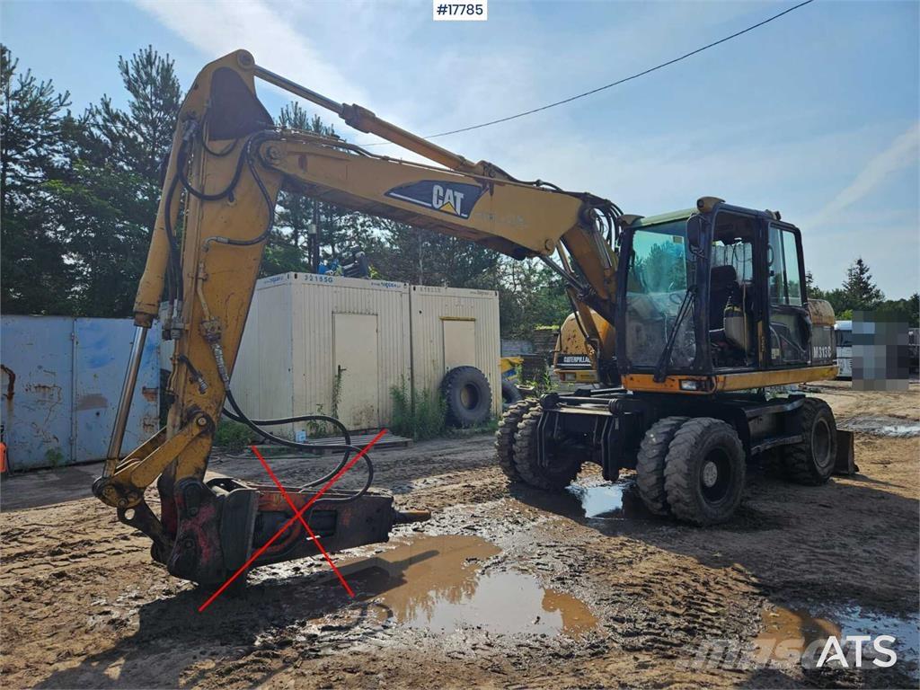 CAT M313 C Excavatoare cu roti