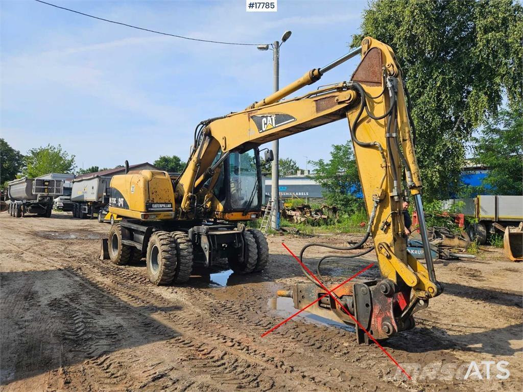 CAT M313 C Excavatoare cu roti