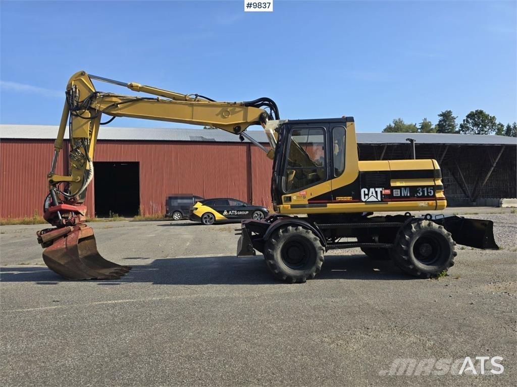 CAT M315 Excavatoare cu roti