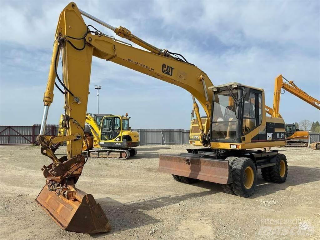 CAT M 315 Excavatoare cu roti