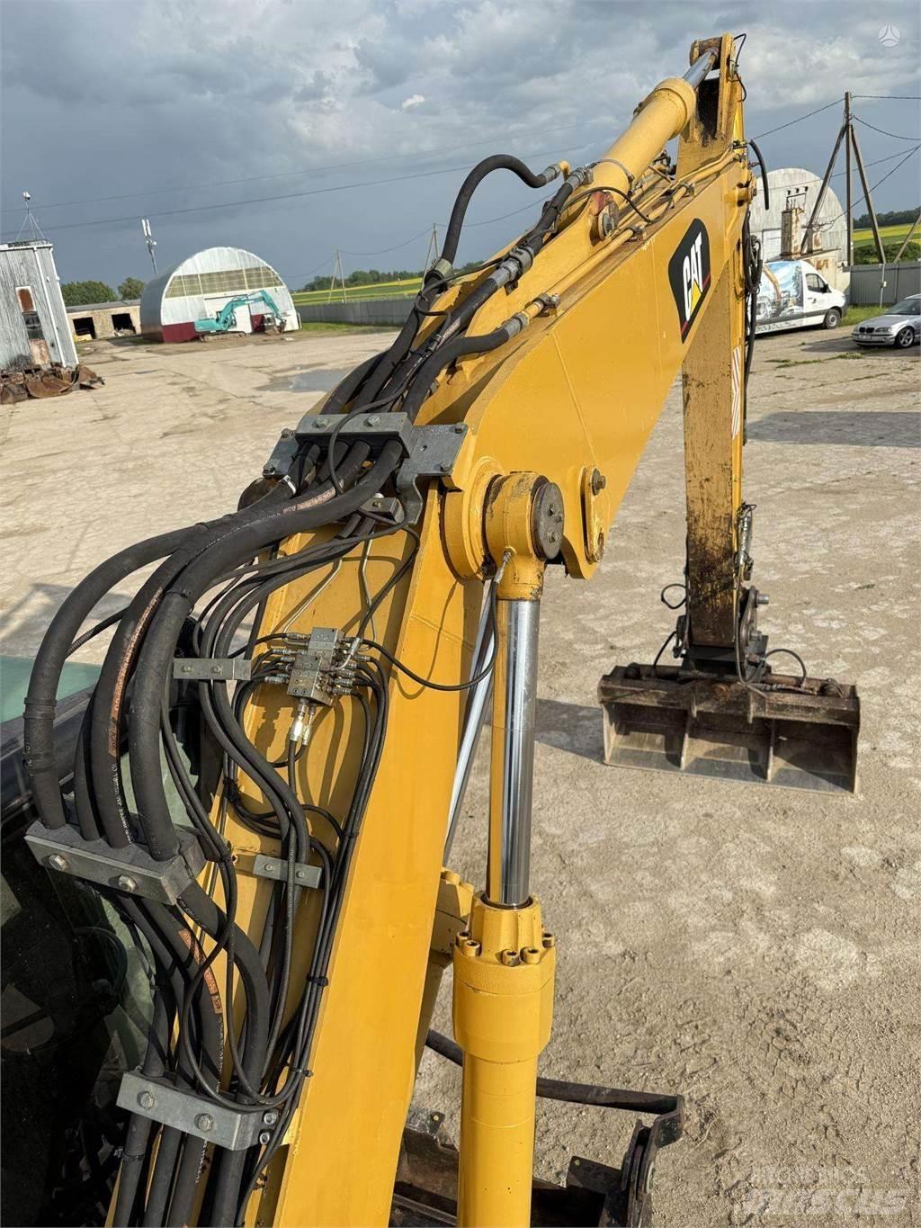CAT M315C Excavatoare cu roti