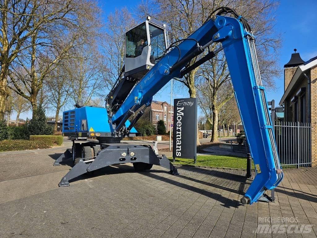 Fuchs MHL 320 Paleta de manipulare