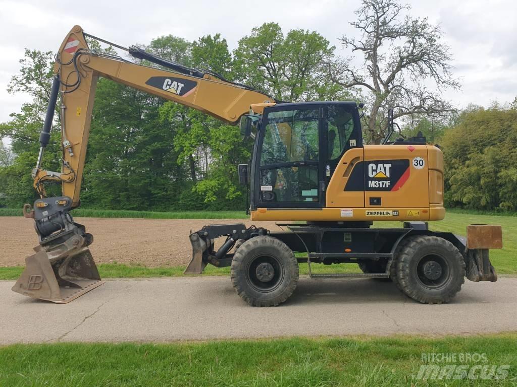 CAT M 317 F Excavatoare cu roti