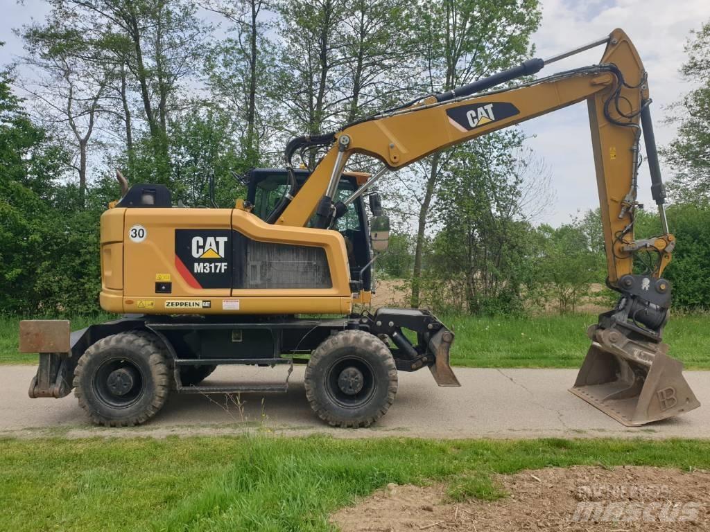 CAT M 317 F Excavatoare cu roti