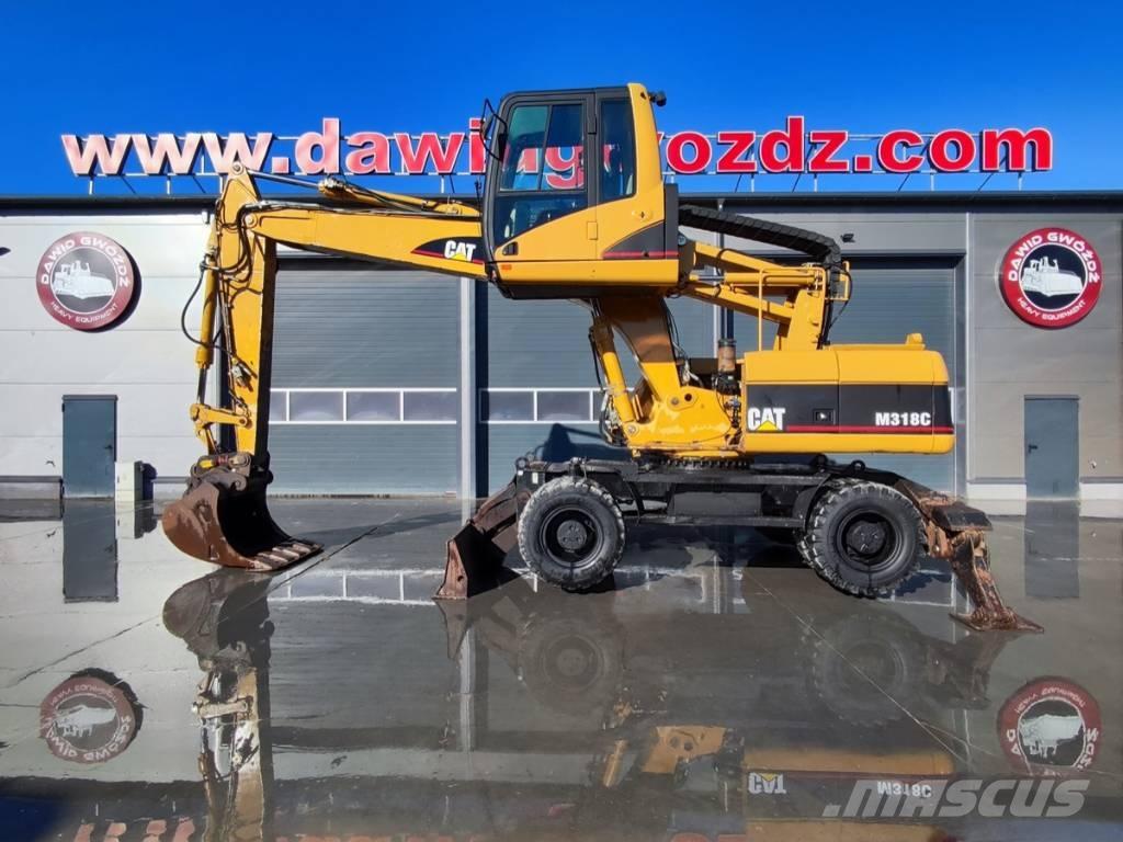 CAT M 318 C Excavatoare cu roti