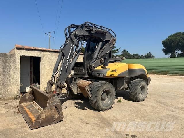Mecalac 12 MTX Excavatoare cu roti