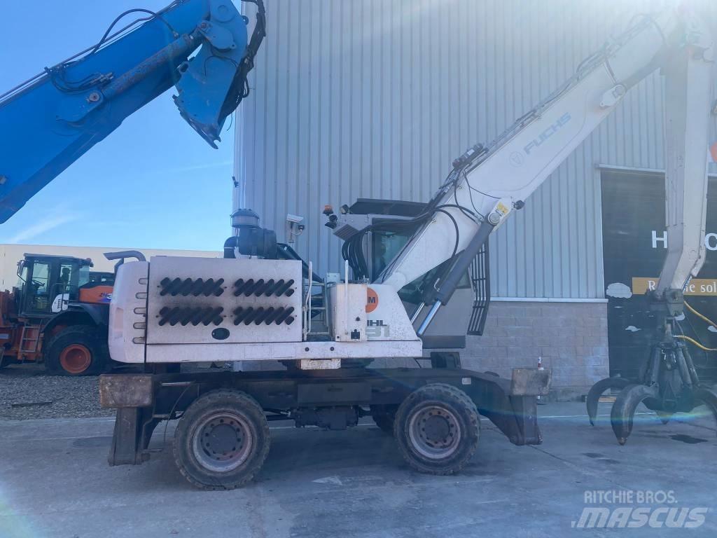Fuchs MHL 331 Paleta de manipulare