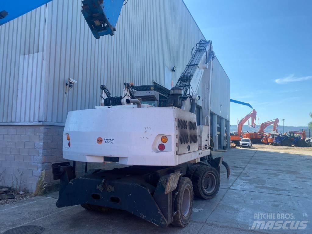 Fuchs MHL 331 Paleta de manipulare