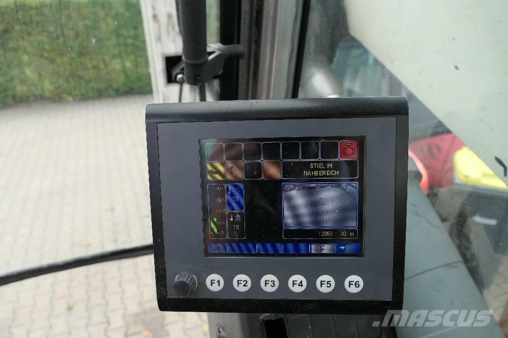 Fuchs MHL 320 Paleta de manipulare
