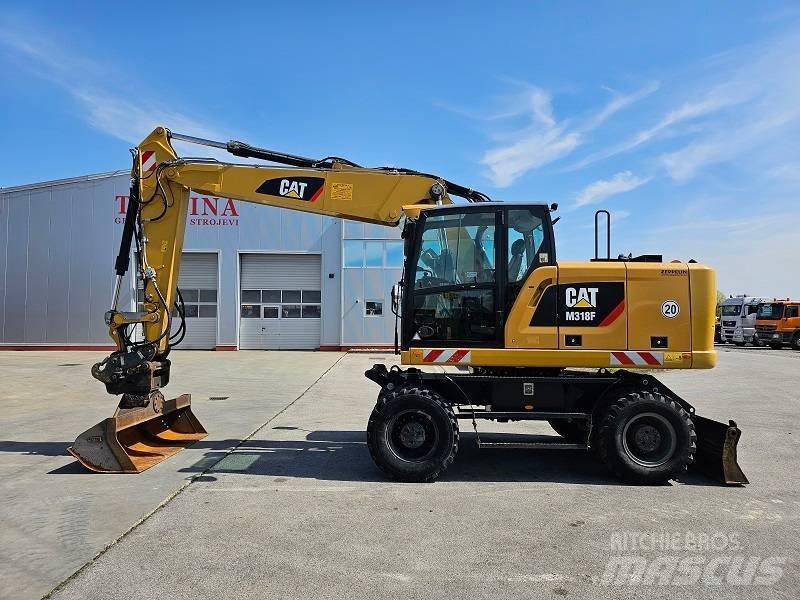 CAT M 318 F Excavatoare cu roti