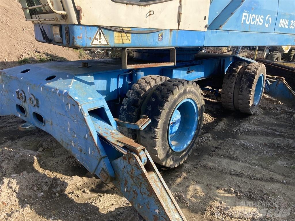 Fuchs MHL 331 Paleta de manipulare