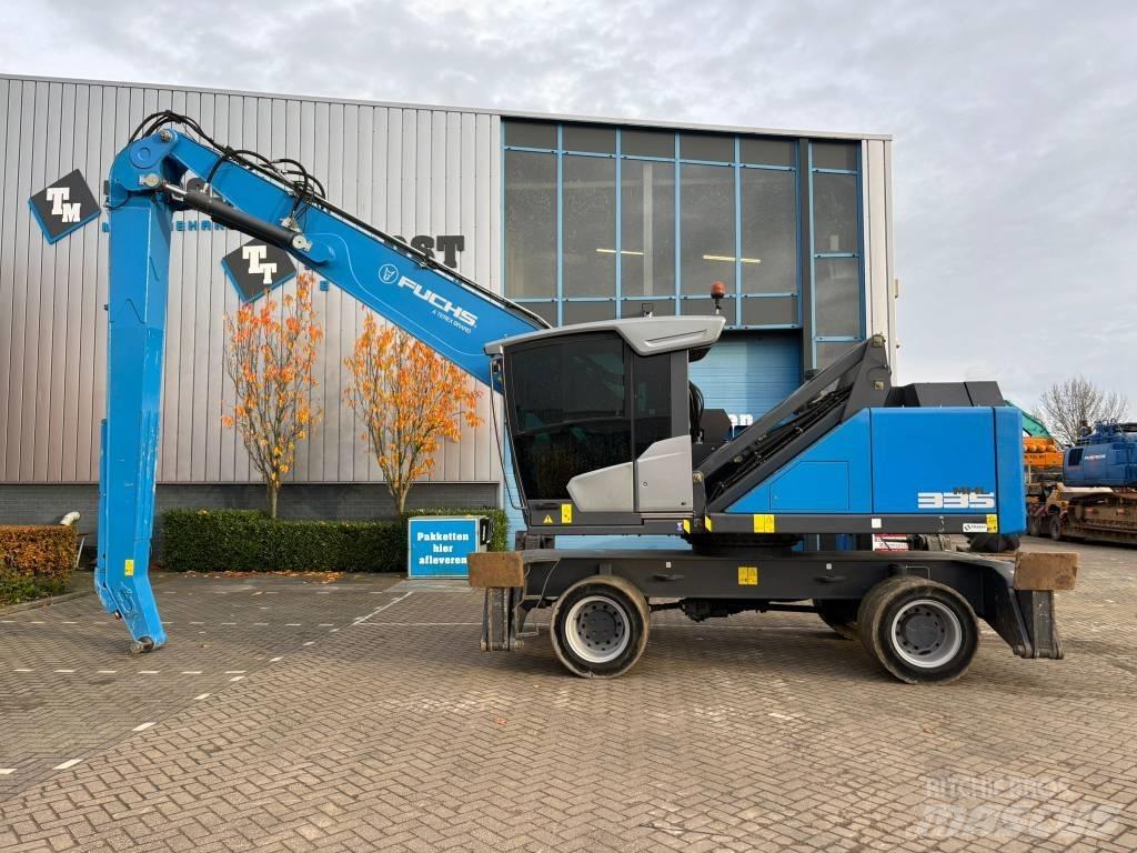 Fuchs MHL 335 Paleta de manipulare