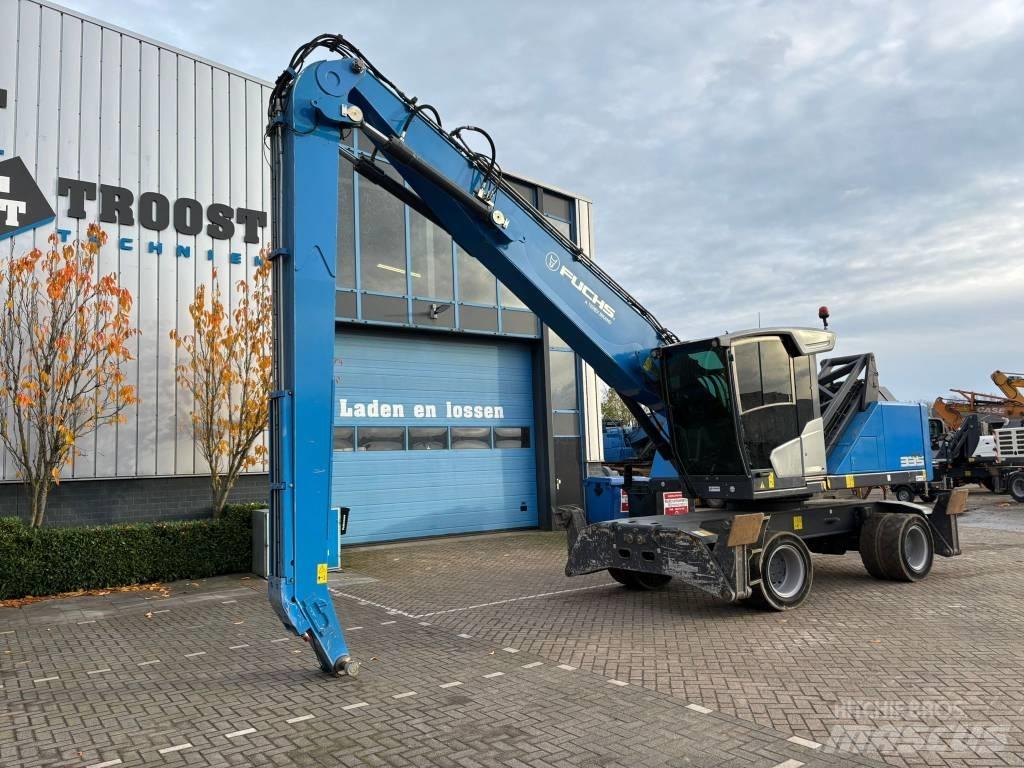 Fuchs MHL 335 Paleta de manipulare