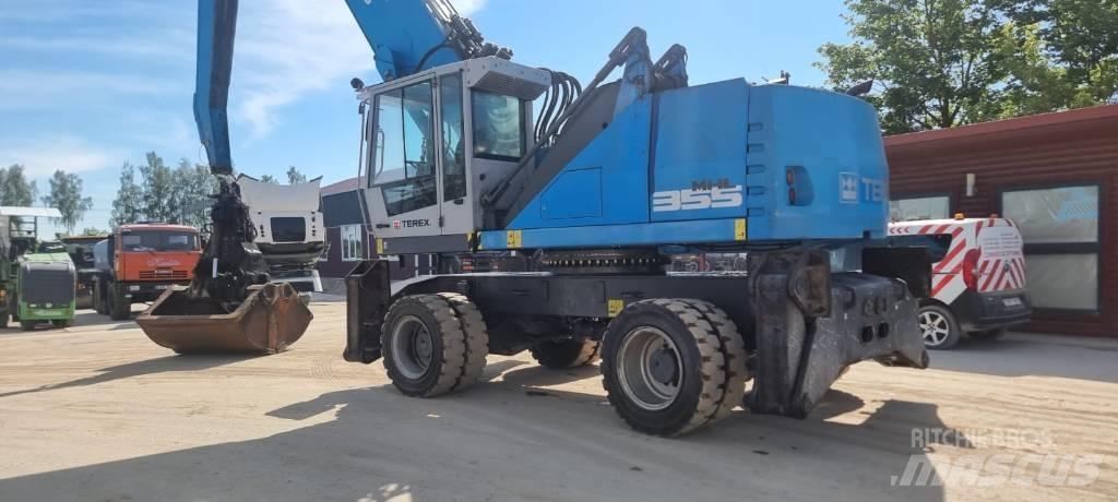 Fuchs MHL 355 Paleta de manipulare