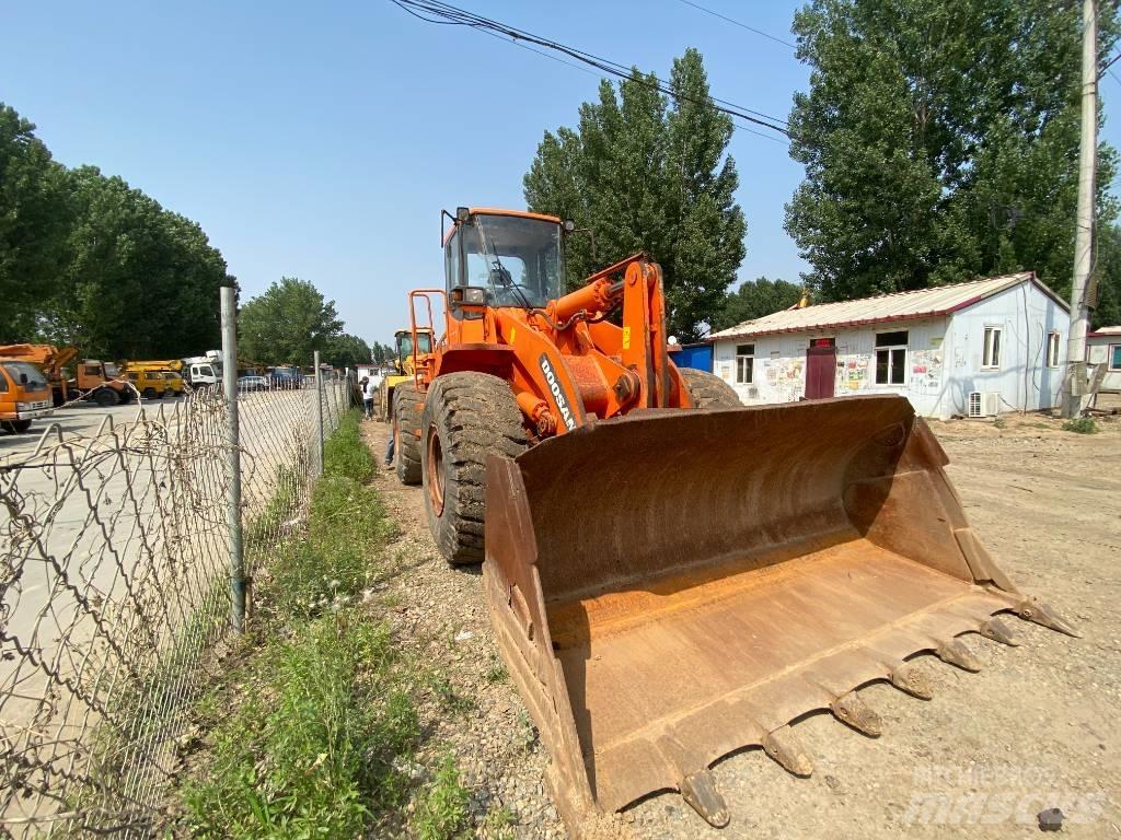 Doosan DL503 Buldoexcavatoare