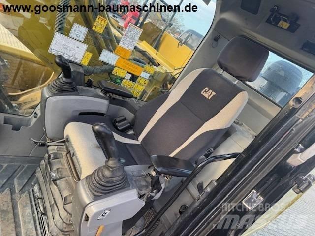 CAT 323 EL Excavatoare pe șenile
