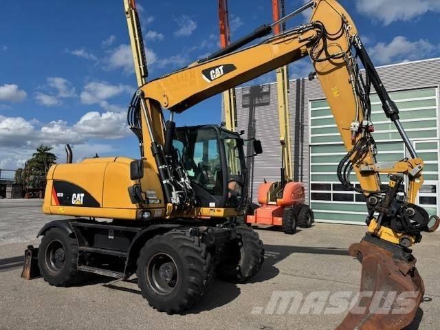 CAT M 313 D Excavatoare cu roti