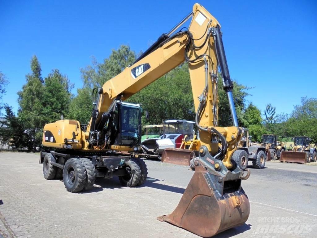 CAT M 322 D Excavatoare cu roti