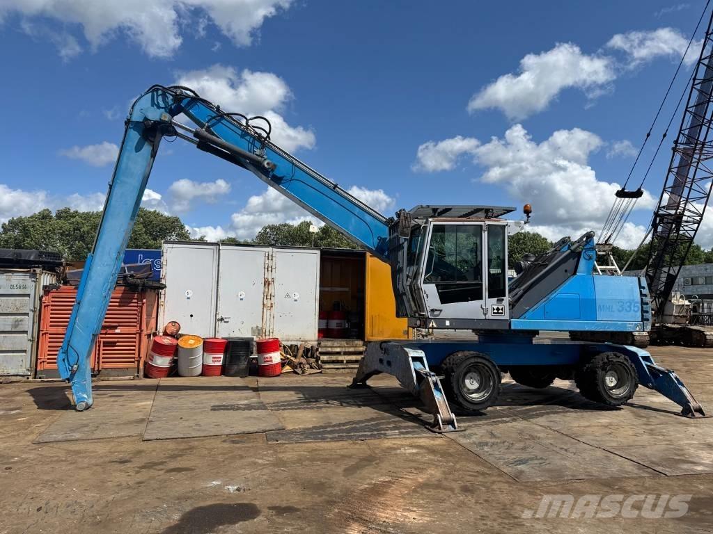 Fuchs MHL 335 Paleta de manipulare