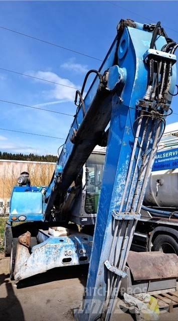 Fuchs MHL 320D Paleta de manipulare