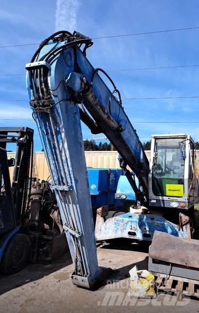Fuchs MHL 320D Paleta de manipulare