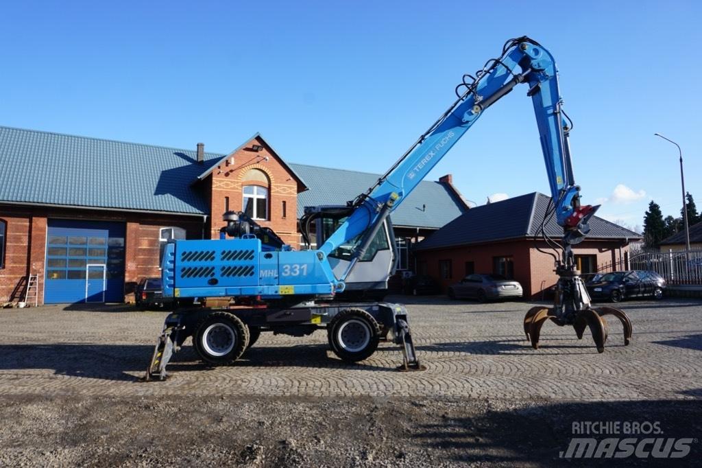 Fuchs MHL 331 Paleta de manipulare