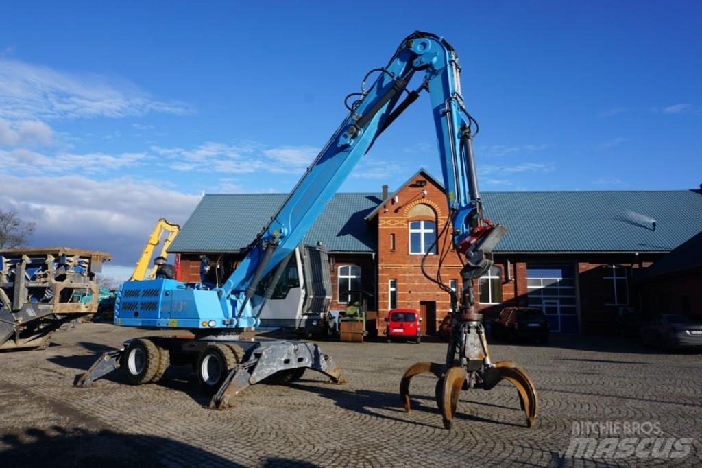 Fuchs MHL 331 Paleta de manipulare