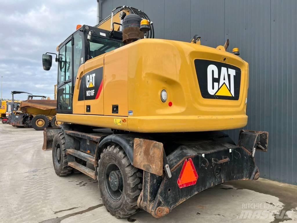 CAT M318F Excavatoare cu roti