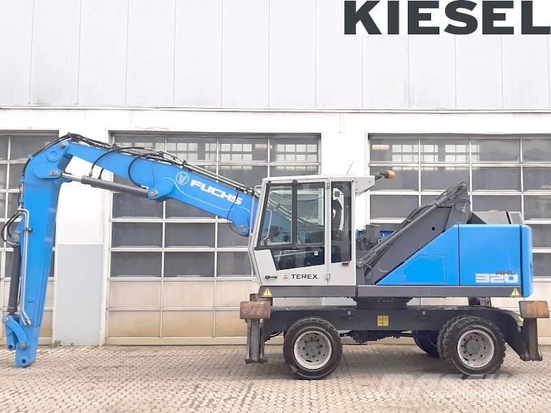 Fuchs MHL 320 F Paleta de manipulare