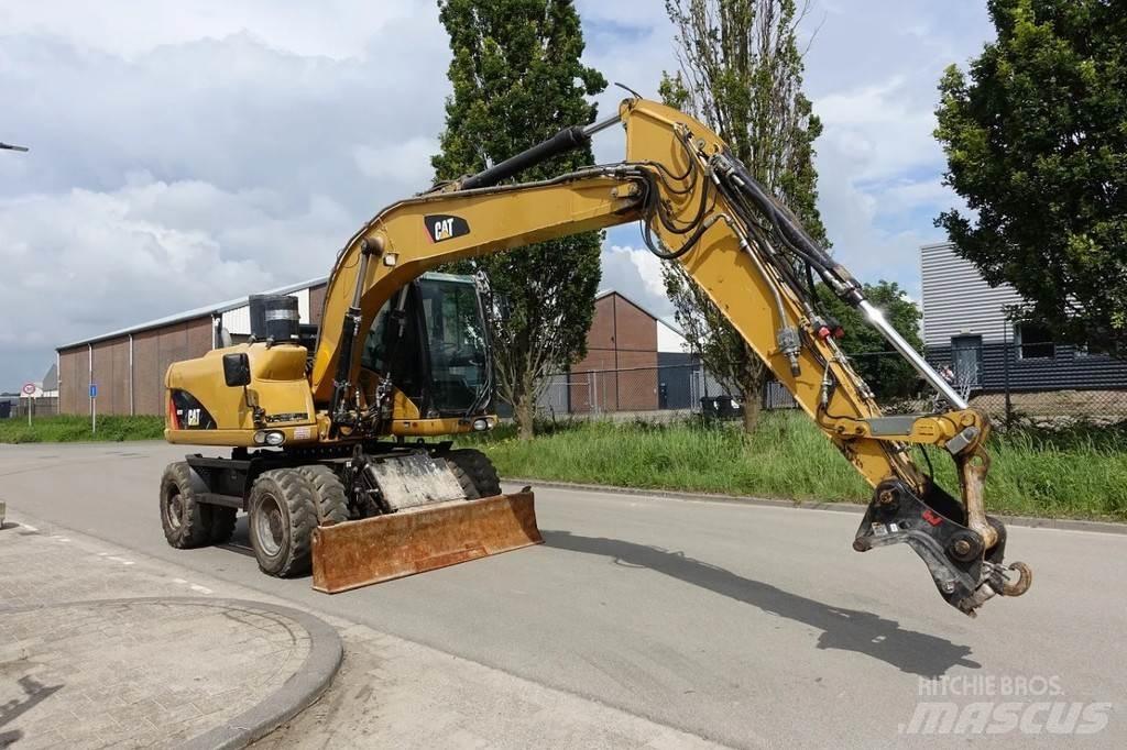 CAT M313 D Excavatoare cu roti