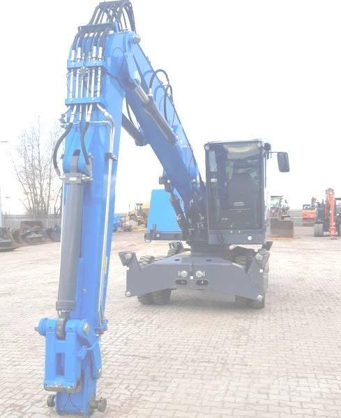 Fuchs MHL 320 F Paleta de manipulare