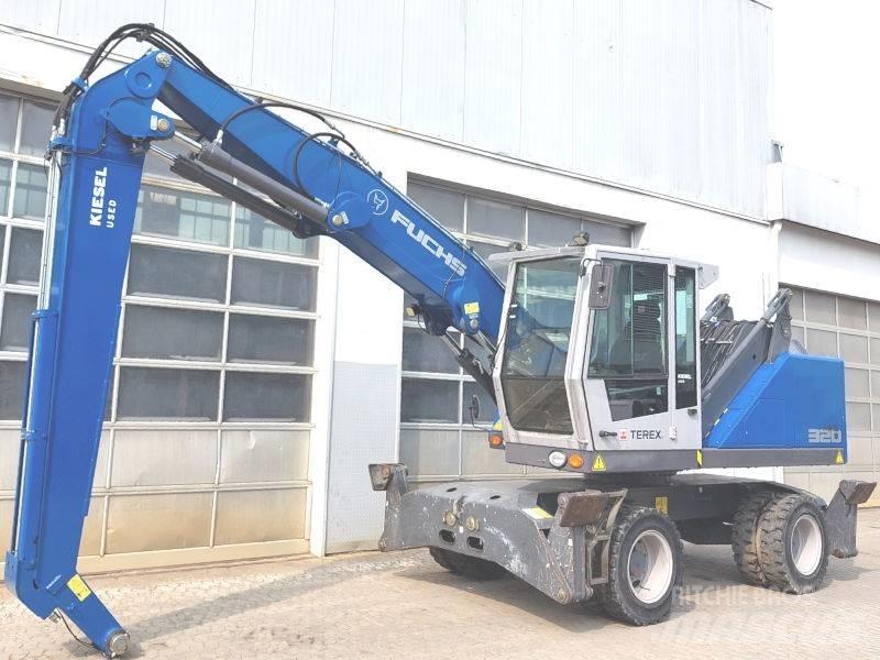 Fuchs MHL 320 F Paleta de manipulare