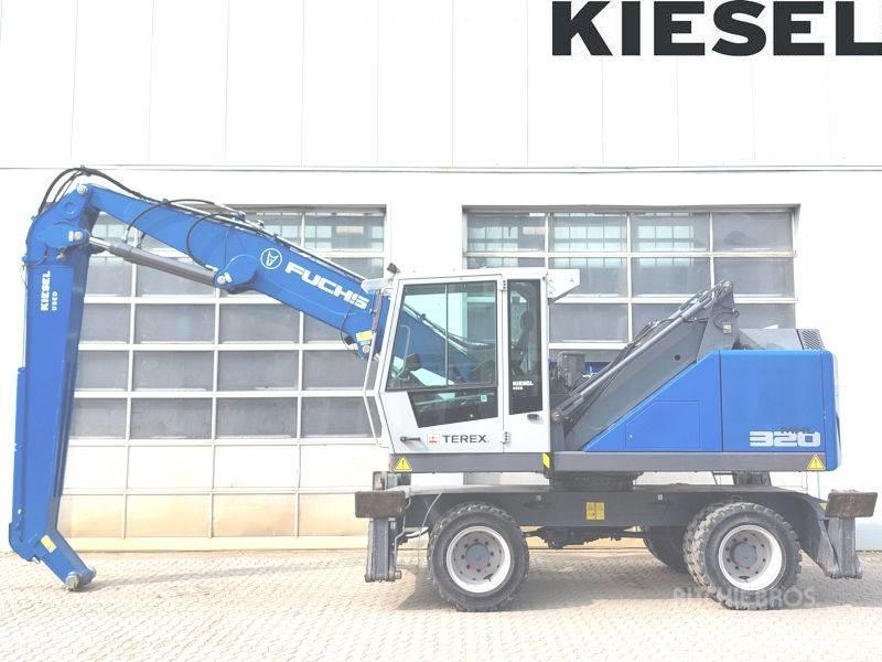 Fuchs MHL 320 F Paleta de manipulare