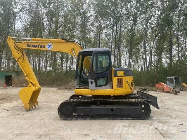 Komatsu PC128US Excavatoare pe șenile
