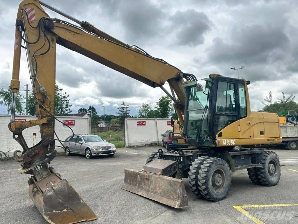 CAT 315 C Excavatoare cu roti