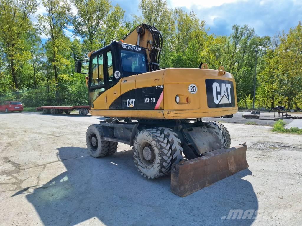 CAT M 315 D Excavatoare cu roti