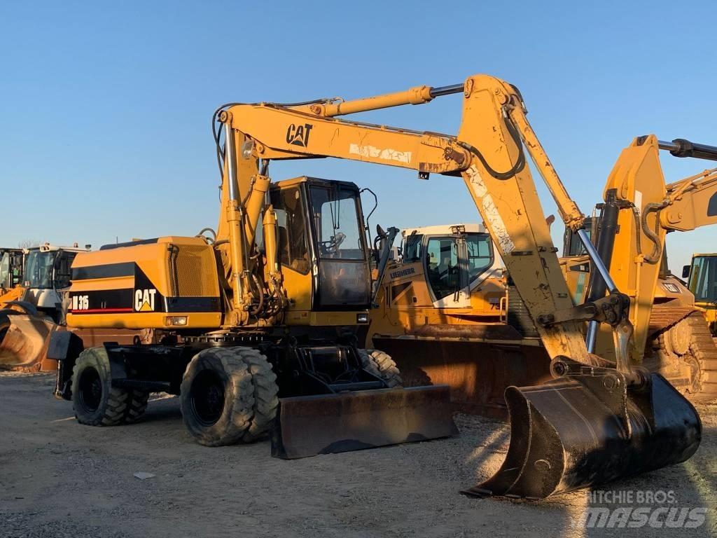 CAT M 315 Excavatoare cu roti
