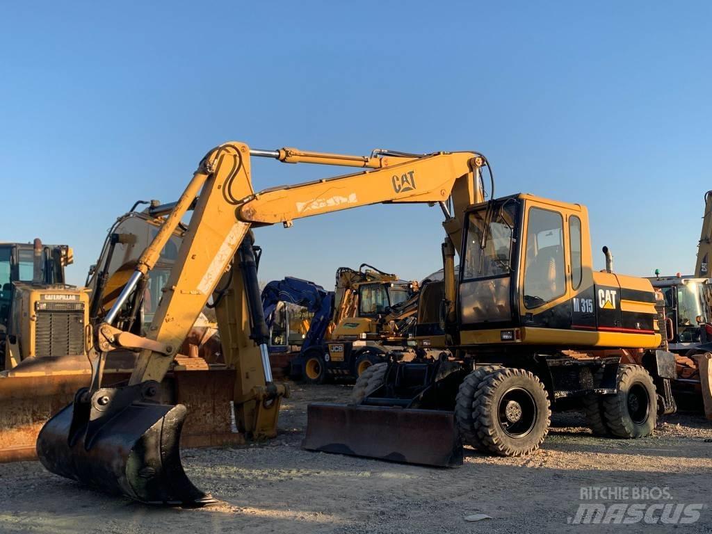 CAT M 315 Excavatoare cu roti