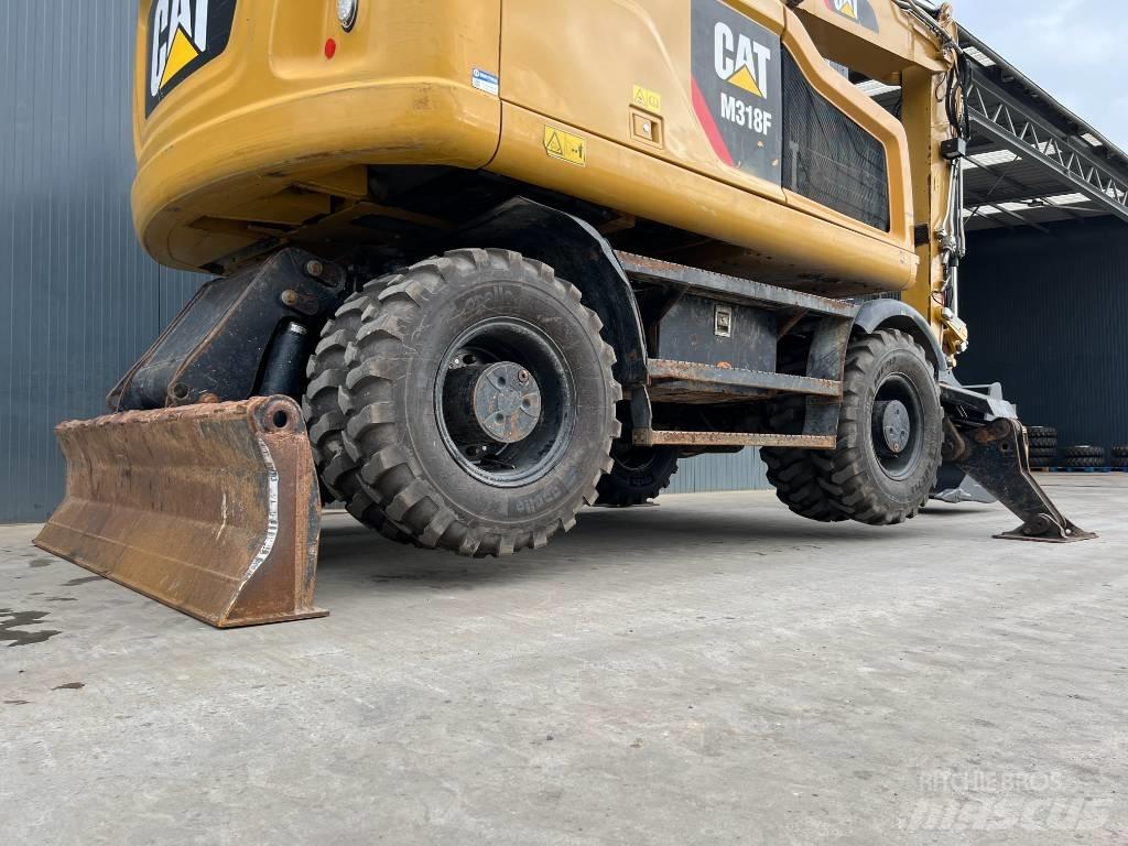 CAT M318F Excavatoare cu roti