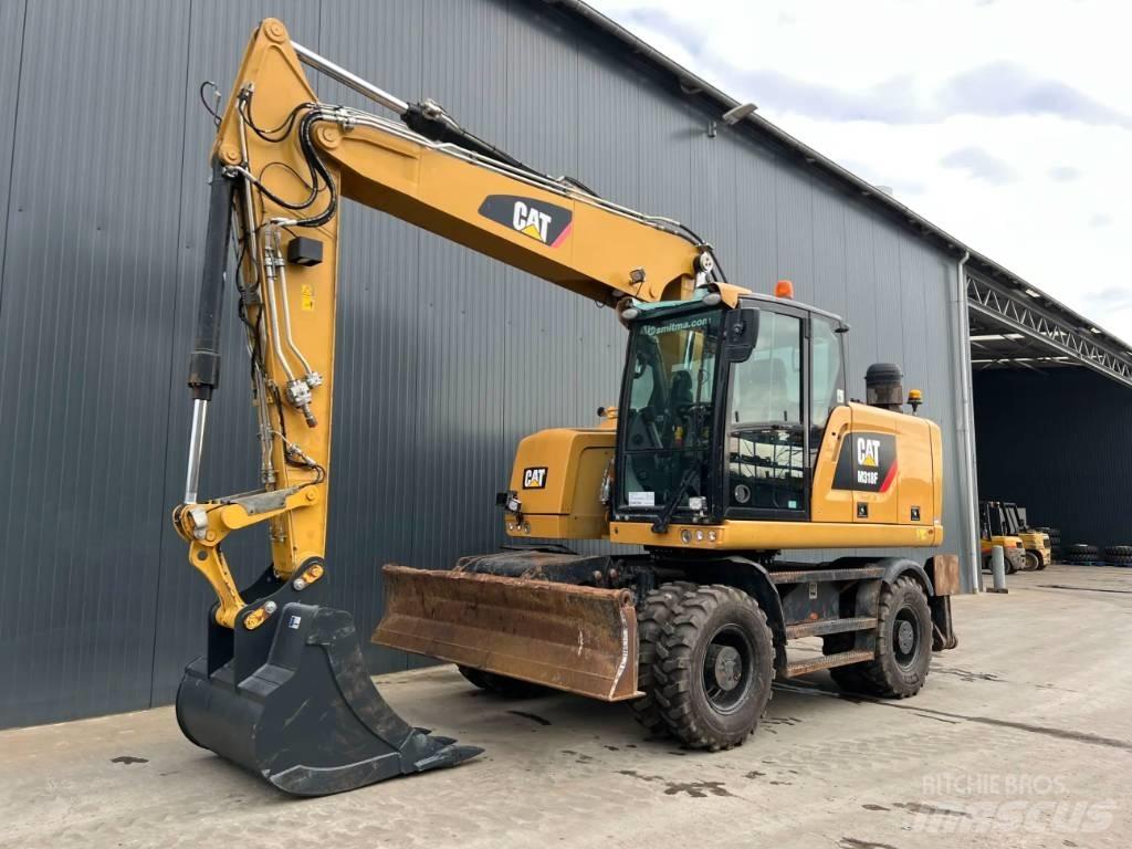 CAT M318F Excavatoare cu roti