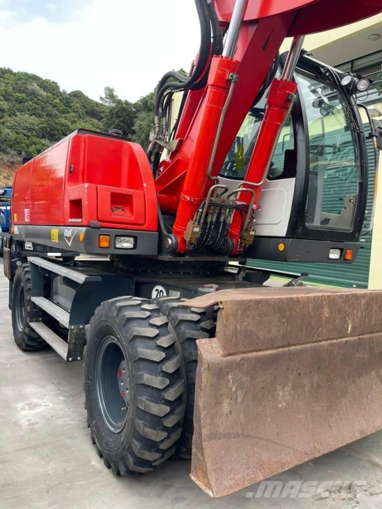 O&K MH 6.6 Excavatoare cu roti