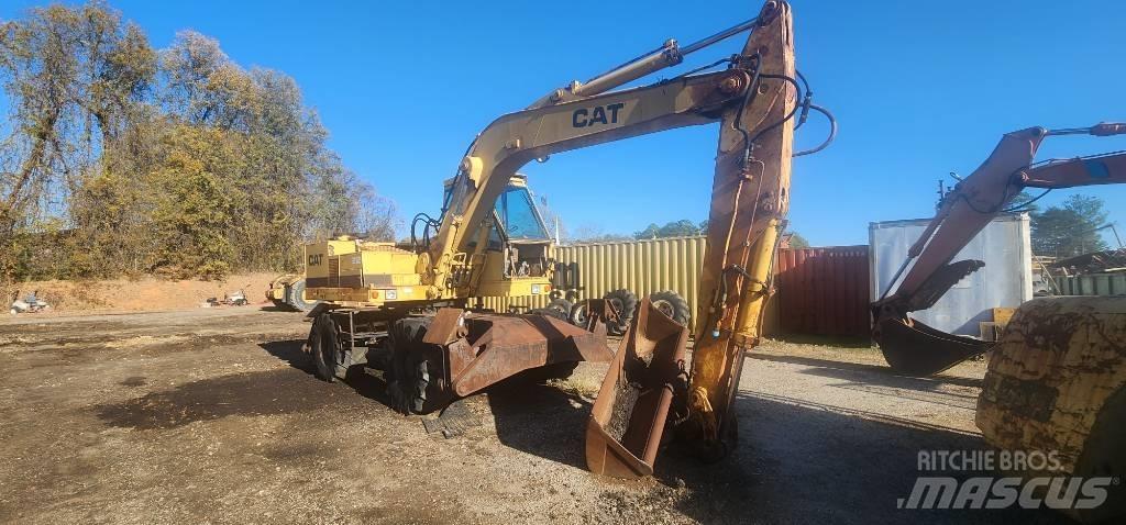 CAT 212 Excavatoare cu roti