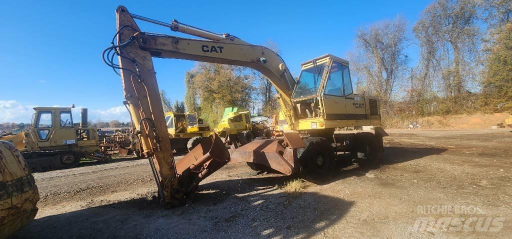CAT 212 Excavatoare cu roti