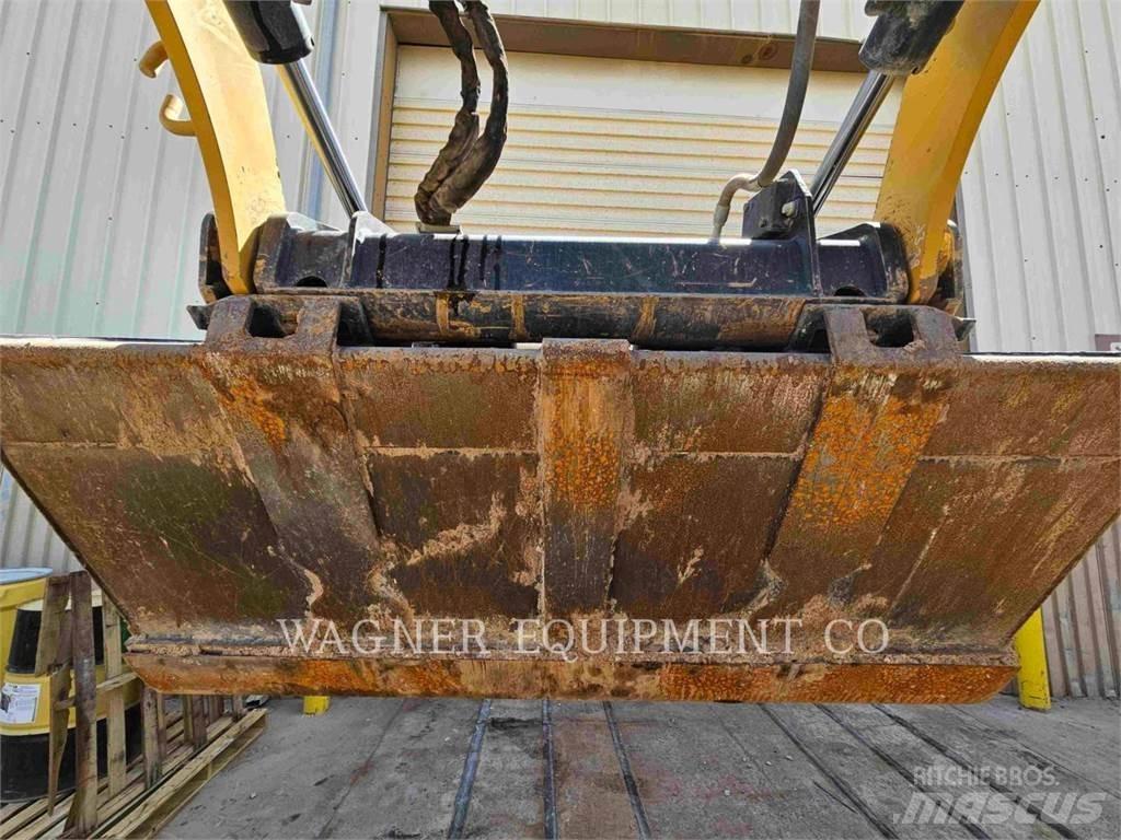 CAT 259D3 Încarcatoare cu excavator