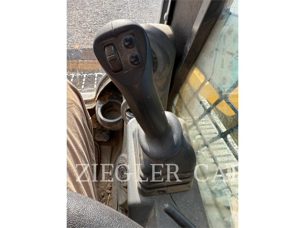 CAT 259D3 Încarcatoare cu excavator