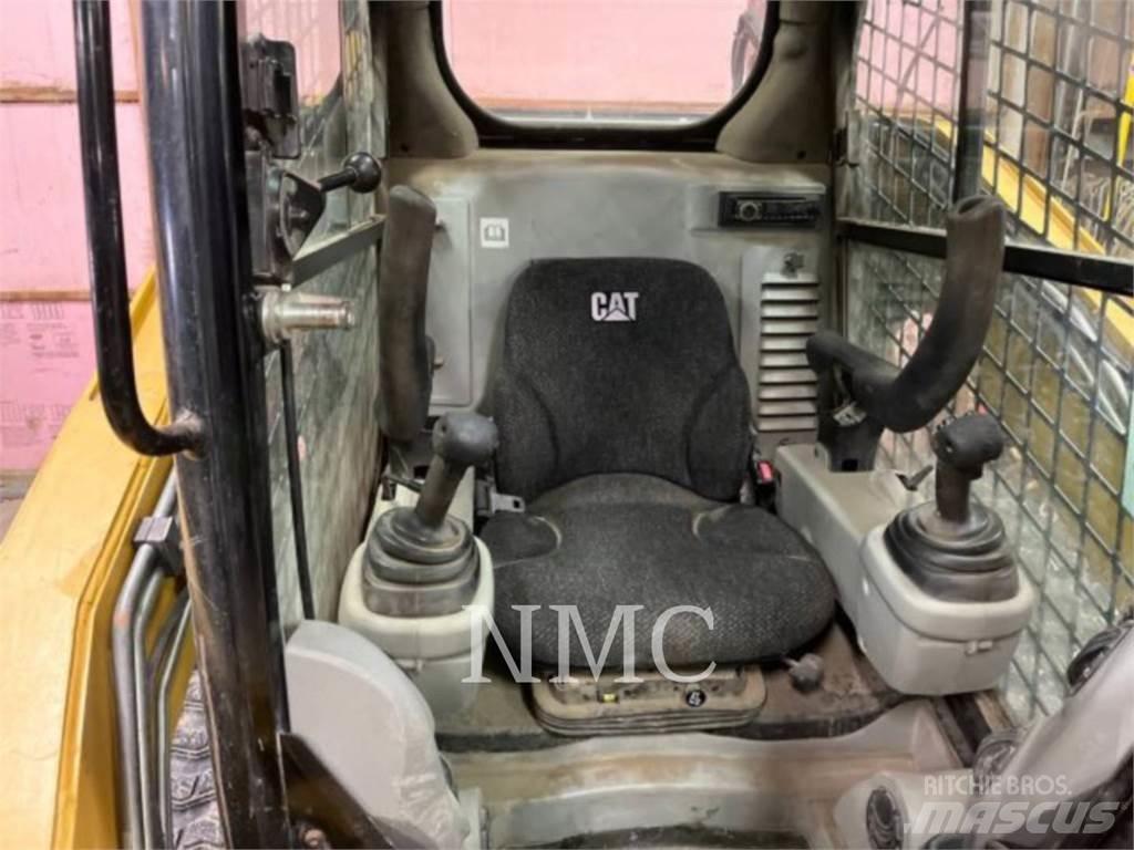 CAT 289C Încarcatoare cu excavator