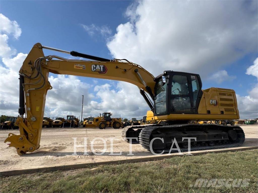 CAT 323 TC Incarcator pe pneuri