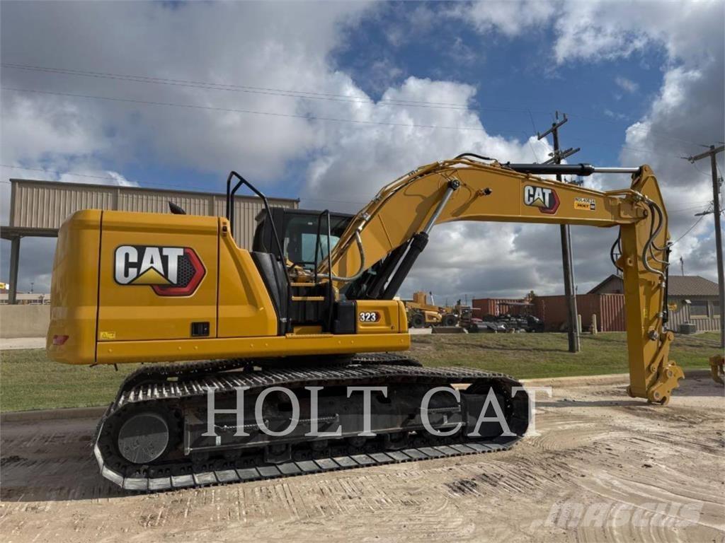 CAT 323 TC Incarcator pe pneuri